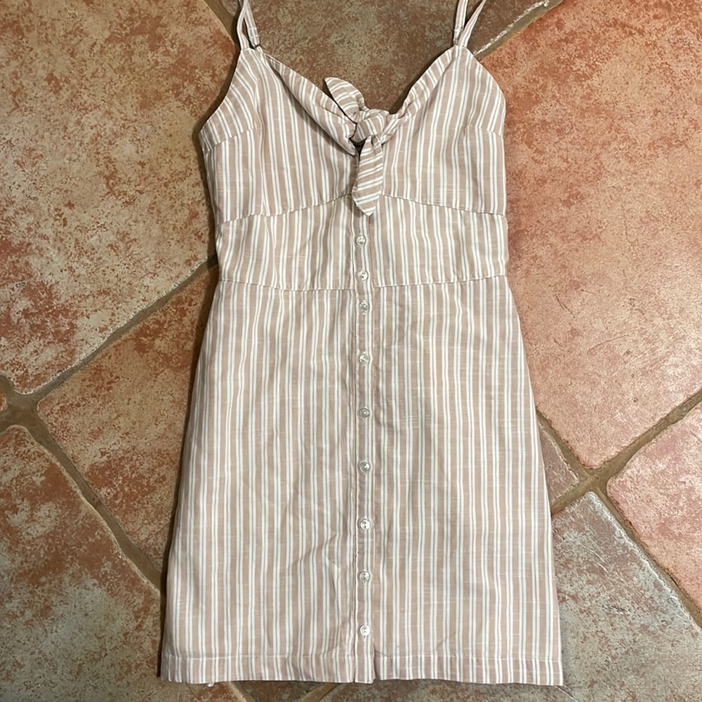 New with tags! Pink and white stripe mini dress with spaghetti straps